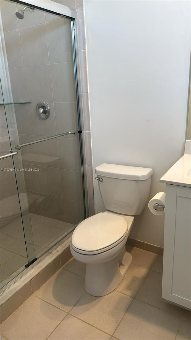 4015 W Mcnab Rd Unit D101, Pompano Beach, FL 33069 - bathroom featuring tile patterned floors, vanity, and a shower stall