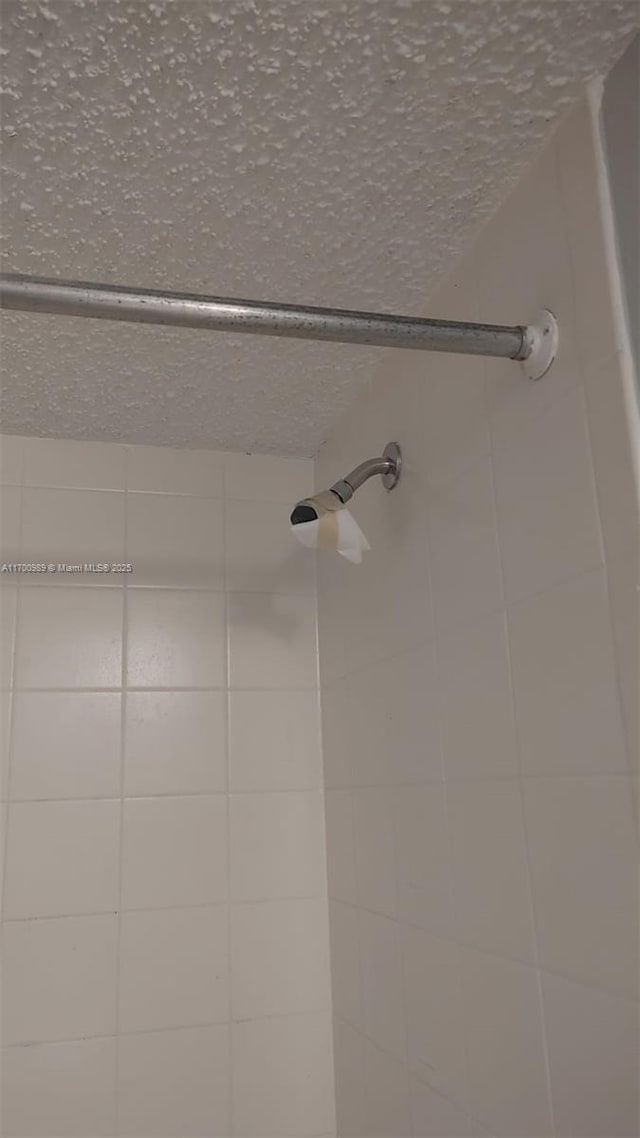 4015 W Mcnab Rd Unit D101, Pompano Beach, FL 33069 - bathroom view of tiled shower
