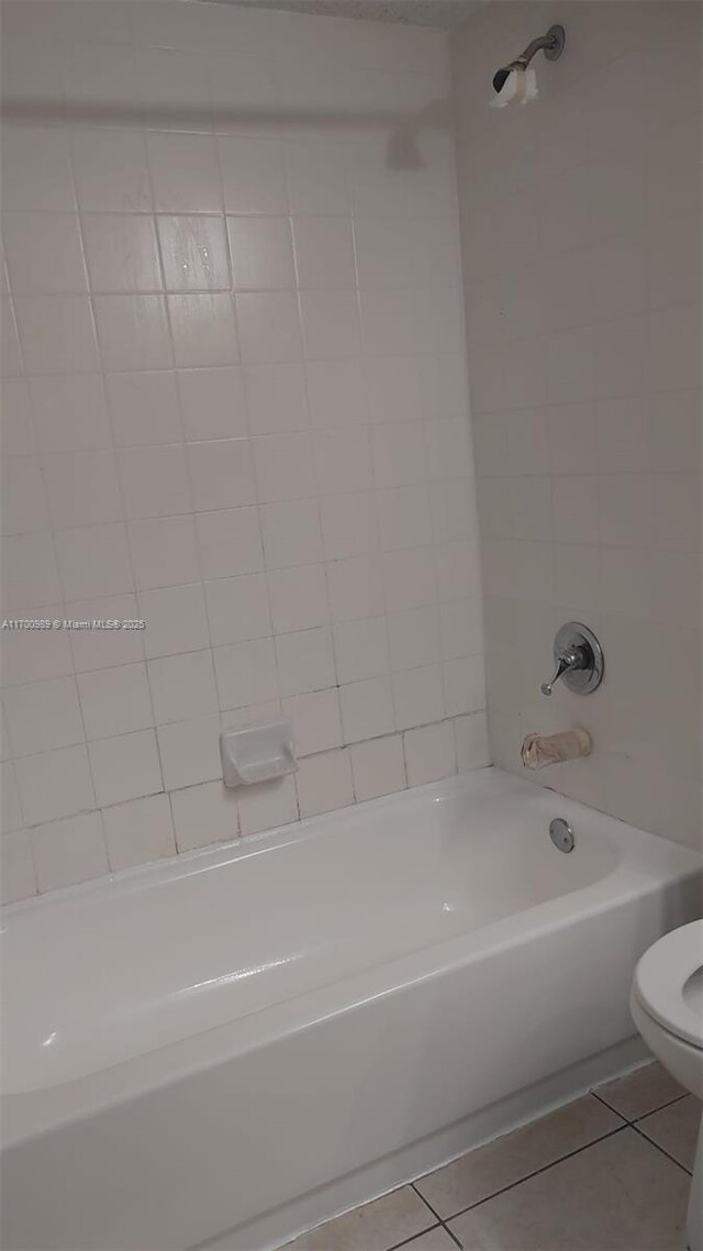 4015 W Mcnab Rd Unit D101, Pompano Beach, FL 33069 - full bathroom with tile patterned floors and shower / bath combination