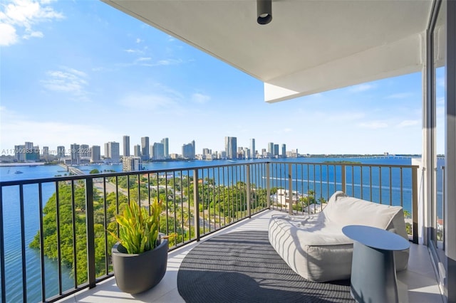 balcony featuring a water view