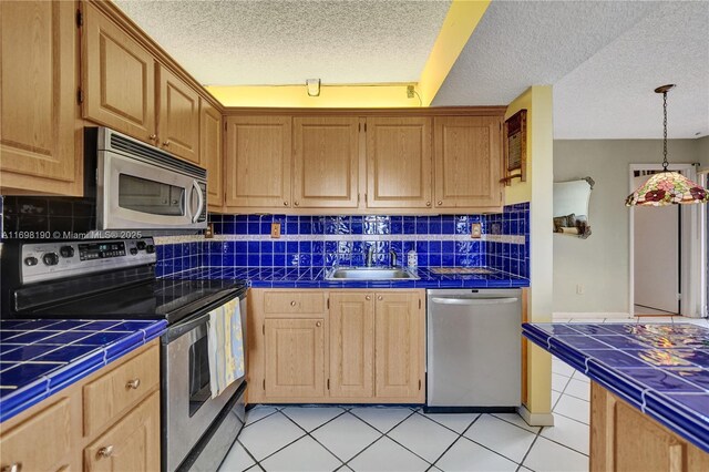 1104 N Hiatus Rd Unit 1104, Pembroke Pines, FL 33026 - dining room with light tile patterned flooring, a textured ceiling, and baseboards