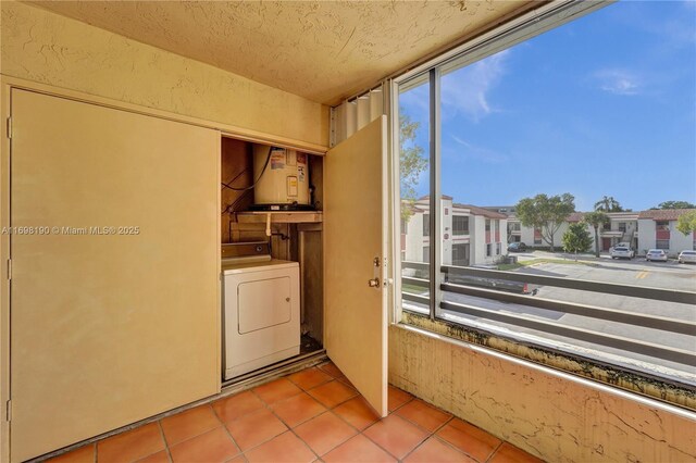 1104 N Hiatus Rd Unit 1104, Pembroke Pines, FL 33026 - kitchen featuring stainless steel dishwasher, a sink, tile counters, a ceiling fan, and healthy amount of natural light
