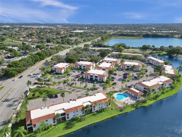 1104 N Hiatus Rd Unit 1104, Pembroke Pines, FL 33026 - bedroom featuring carpet floors, a ceiling fan, baseboards, and a textured ceiling