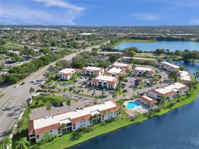 drone / aerial view with a water view