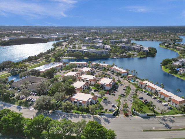 drone / aerial view with a water view