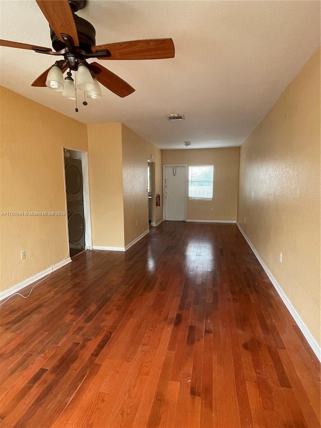 spare room with hardwood / wood-style floors and ceiling fan