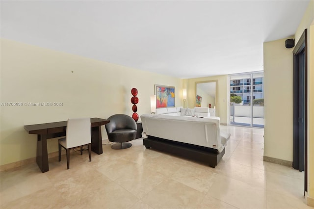 bedroom featuring access to exterior and expansive windows