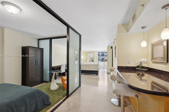 bedroom featuring expansive windows