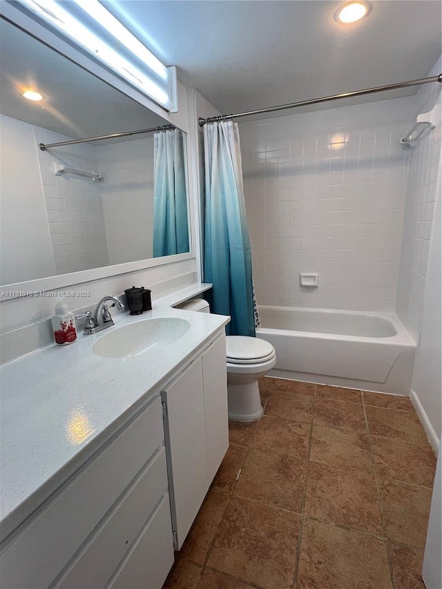 full bathroom with vanity, toilet, and shower / bath combo with shower curtain