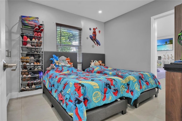 bedroom with tile patterned floors