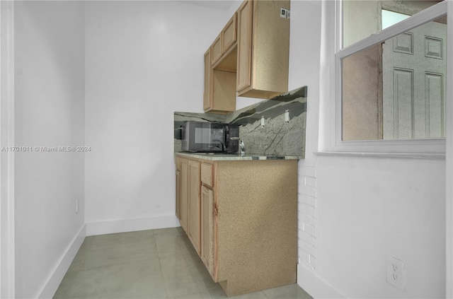 kitchen with tasteful backsplash