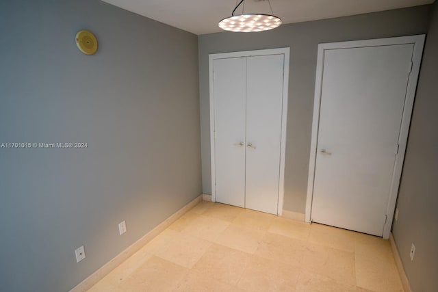 888 Biscayne Blvd Unit 3806, Miami, FL 33132 - unfurnished bedroom featuring baseboards