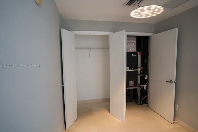 888 Biscayne Blvd Unit 3806, Miami, FL 33132 - unfurnished bedroom featuring a closet and baseboards