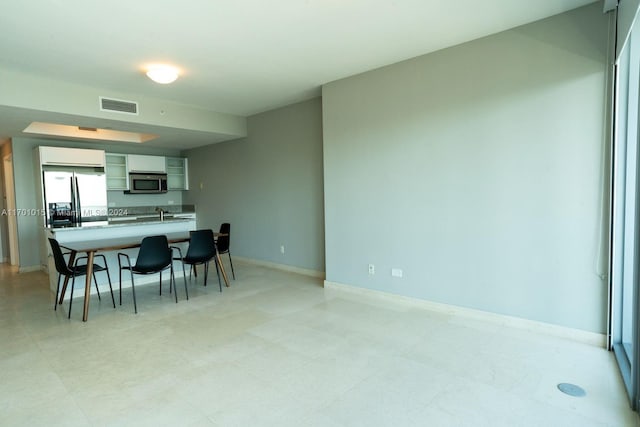 888 Biscayne Blvd Unit 3806, Miami, FL 33132 - dining area with baseboards