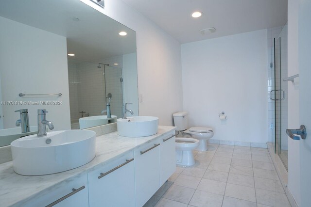 888 Biscayne Blvd Unit 3806, Miami, FL 33132 - full bath featuring a bidet, toilet, a shower stall, recessed lighting, and double vanity