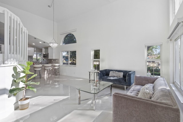 living room with a high ceiling