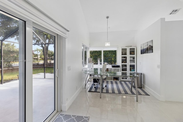 dining area with a wealth of natural light