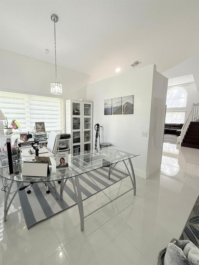 interior space with light tile patterned floors