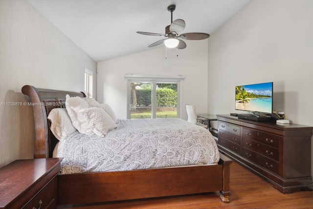 bedroom featuring vaulted ceiling, dark hardwood / wood-style floors, and ceiling fan