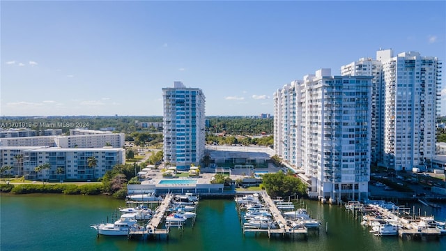 birds eye view of property featuring a water view