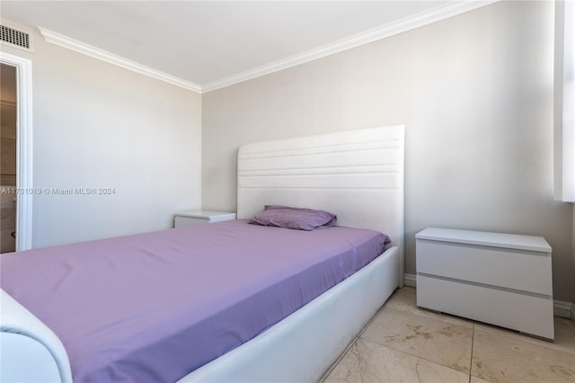 bedroom featuring ornamental molding