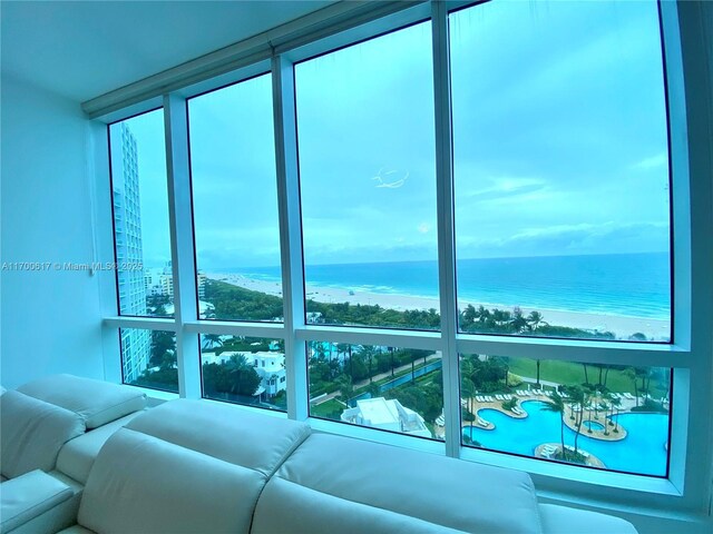 100 S Pointe Dr Unit 1207, Miami Beach, FL 33139 - living area featuring a water view and healthy amount of natural light