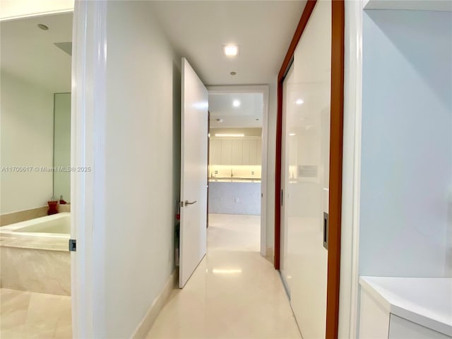 100 S Pointe Dr Unit 1207, Miami Beach, FL 33139 - corridor featuring light tile patterned flooring and recessed lighting