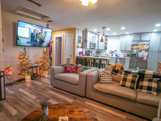 living room with hardwood / wood-style flooring