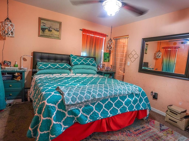 carpeted bedroom with ceiling fan