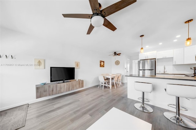 15610 NE 6th Ave Unit 33D, Miami, FL 33162 - living room with a ceiling fan, light wood-style floors, recessed lighting, and baseboards