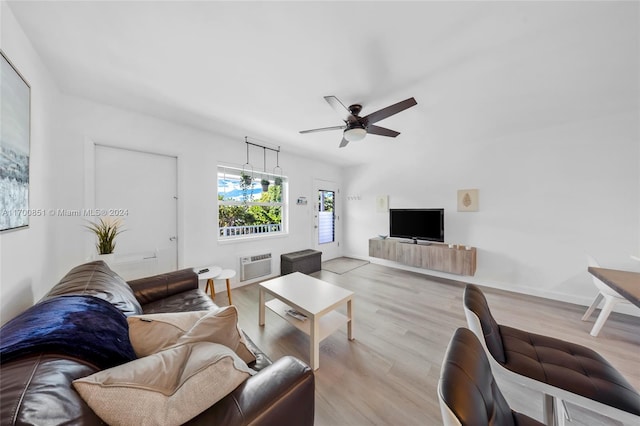 15610 NE 6th Ave Unit 33D, Miami, FL 33162 - living area featuring a ceiling fan, wood finished floors, an AC wall unit, and baseboards