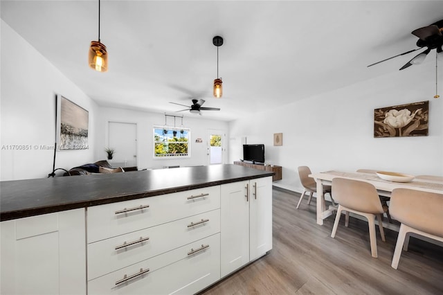 15610 NE 6th Ave Unit 33D, Miami, FL 33162 - kitchen with a ceiling fan, open floor plan, and dark countertops