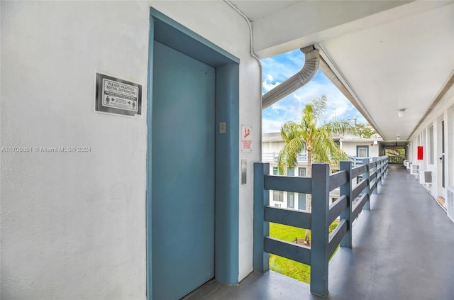 15610 NE 6th Ave Unit 33D, Miami, FL 33162 - view of patio with a balcony and elevator