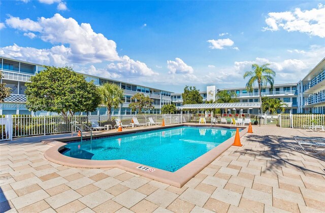 view of swimming pool featuring a patio