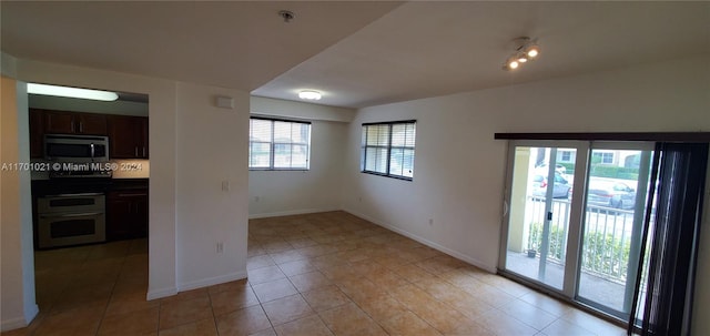 interior space featuring light tile patterned floors