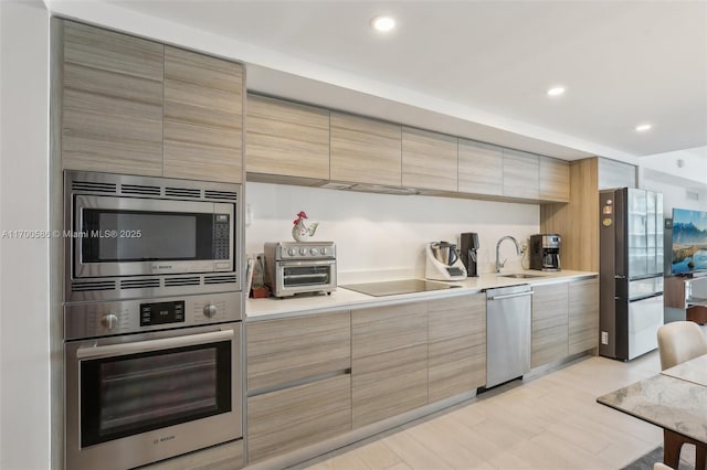 kitchen featuring sink and appliances with stainless steel finishes