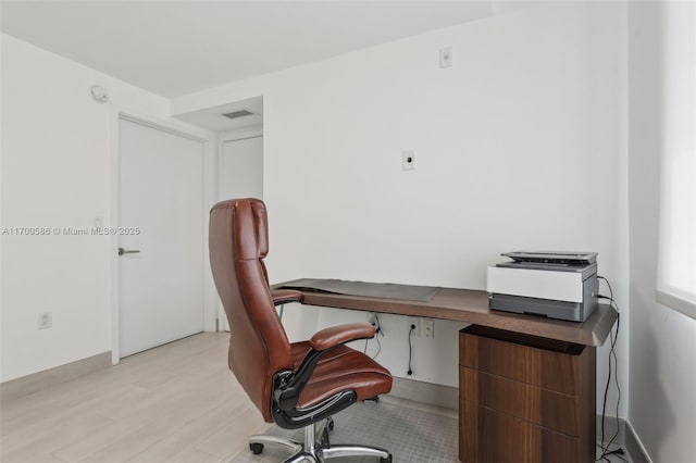 office featuring visible vents and light wood-style floors