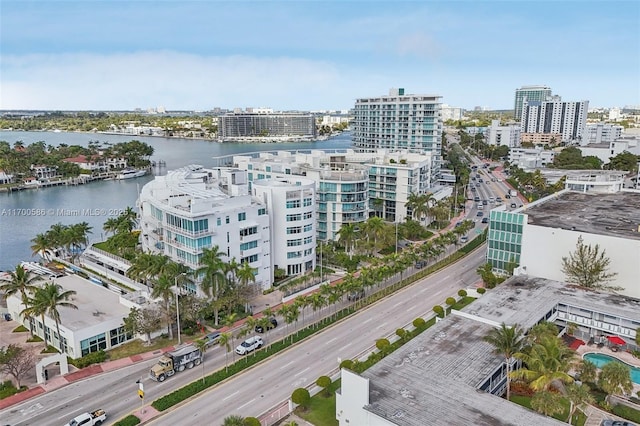 aerial view featuring a water view and a city view