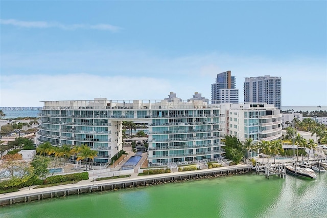 drone / aerial view with a water view and a city view