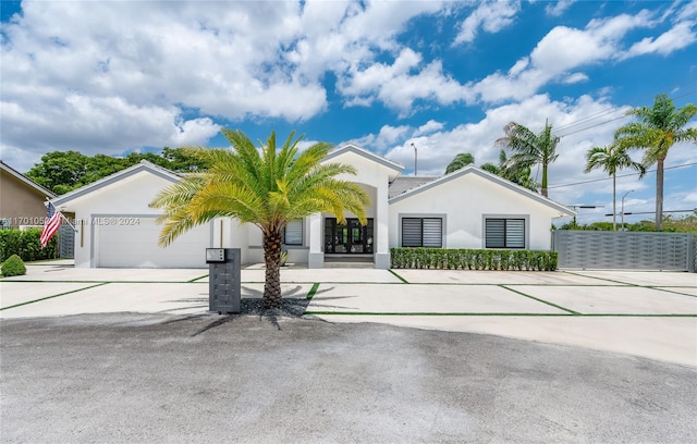 view of front of home with a garage