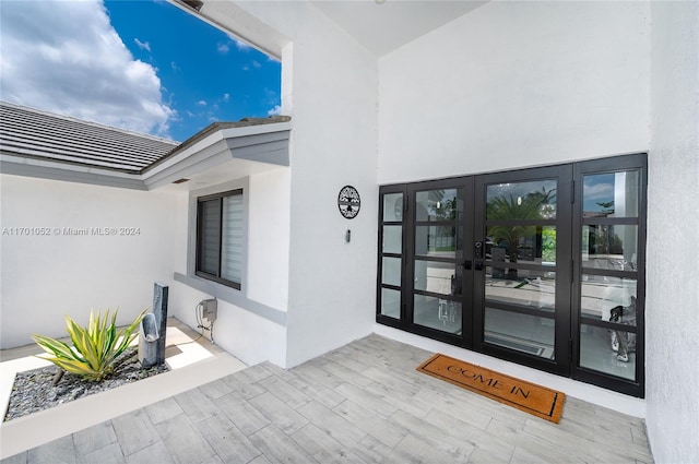 view of exterior entry with french doors