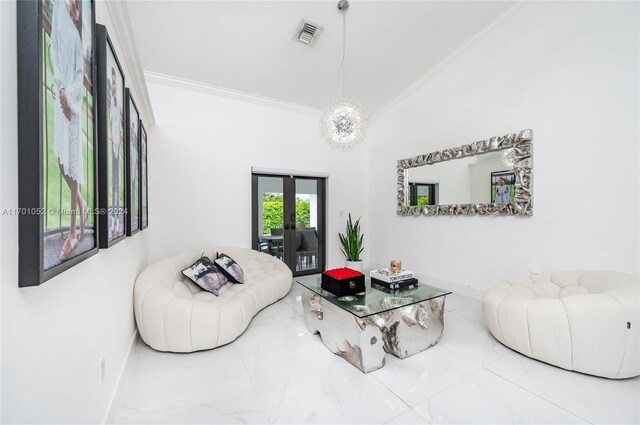 9701 SW 56th Ter, Miami, FL 33173 - living area with crown molding, baseboards, and french doors