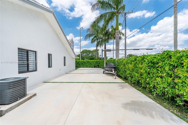 9701 SW 56th Ter, Miami, FL 33173 - view of patio / terrace featuring central air condition unit