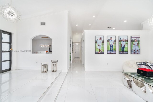 9701 SW 56th Ter, Miami, FL 33173 - hallway with baseboards, marble finish floors, ornamental molding, recessed lighting, and arched walkways