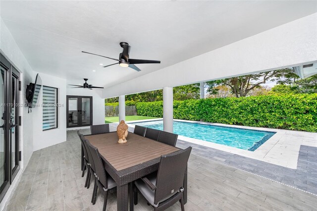 9701 SW 56th Ter, Miami, FL 33173 - view of swimming pool with french doors, ceiling fan, a fenced backyard, and a patio area