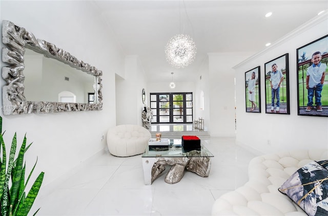 living room featuring french doors, a chandelier, and ornamental molding