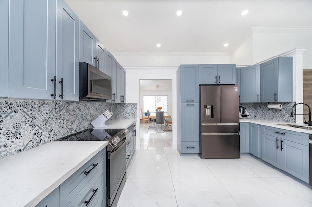 kitchen featuring appliances with stainless steel finishes, tasteful backsplash, crown molding, and sink