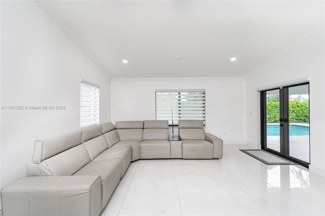 9701 SW 56th Ter, Miami, FL 33173 - living room with crown molding, recessed lighting, baseboards, and light marble finish floors