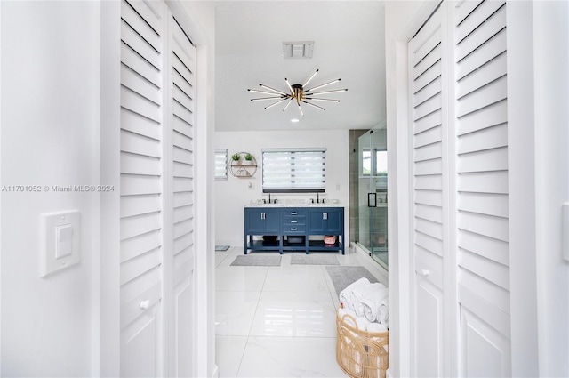 9701 SW 56th Ter, Miami, FL 33173 - hall with light marble finish floors