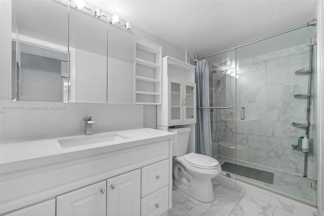 bathroom with toilet, walk in shower, and vanity